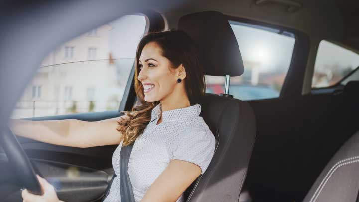 Woman In Driver's Seat Of Car