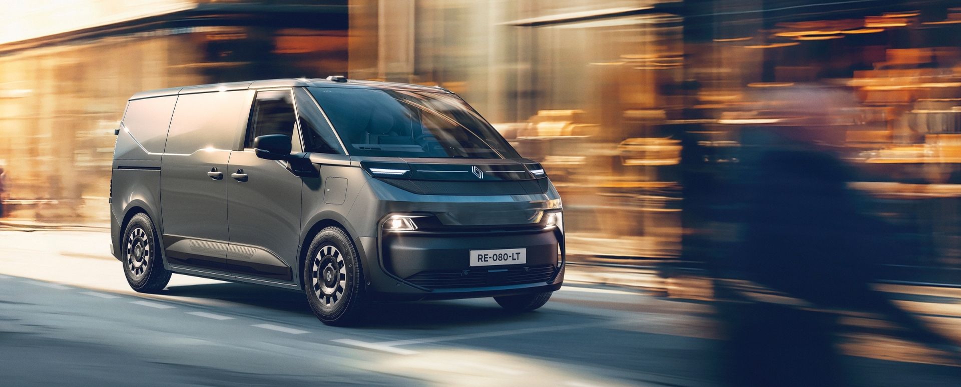 Grey Renault Van Driving Blurred Background