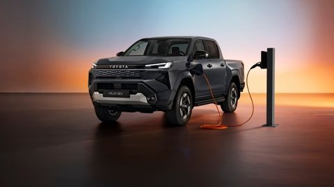 Dark Grey Toyota Hilux Pickup Truck Parked Up Charging