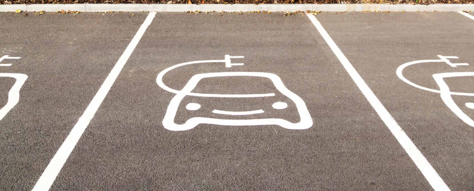 Electric Vehicle Icon In Parking Space