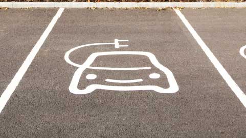 Electric Vehicle Icon In Parking Space