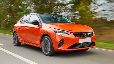 Orange Vauxhall Corsa Electric Driving