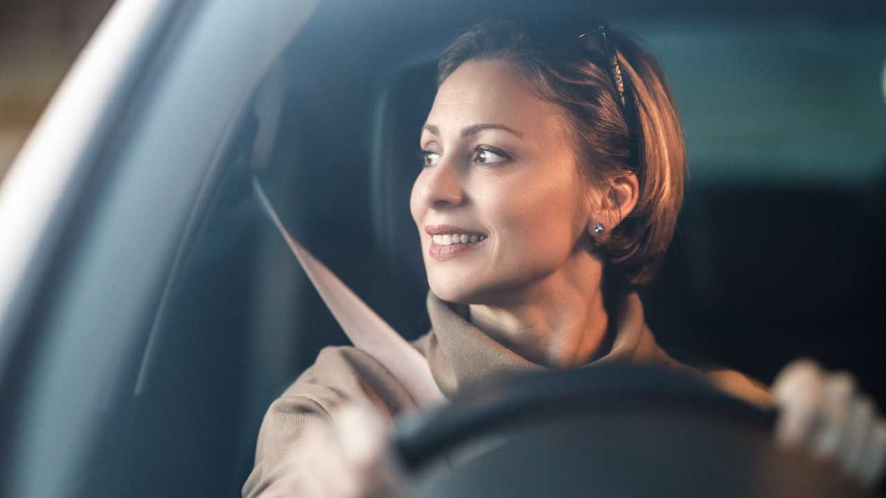 Woman Sitting In Car