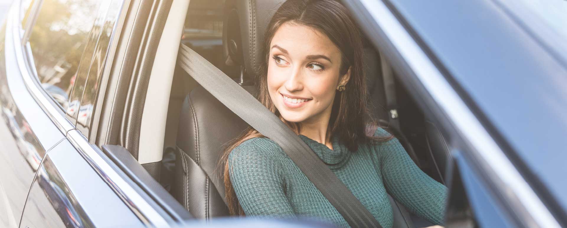 Woman Driving In Car