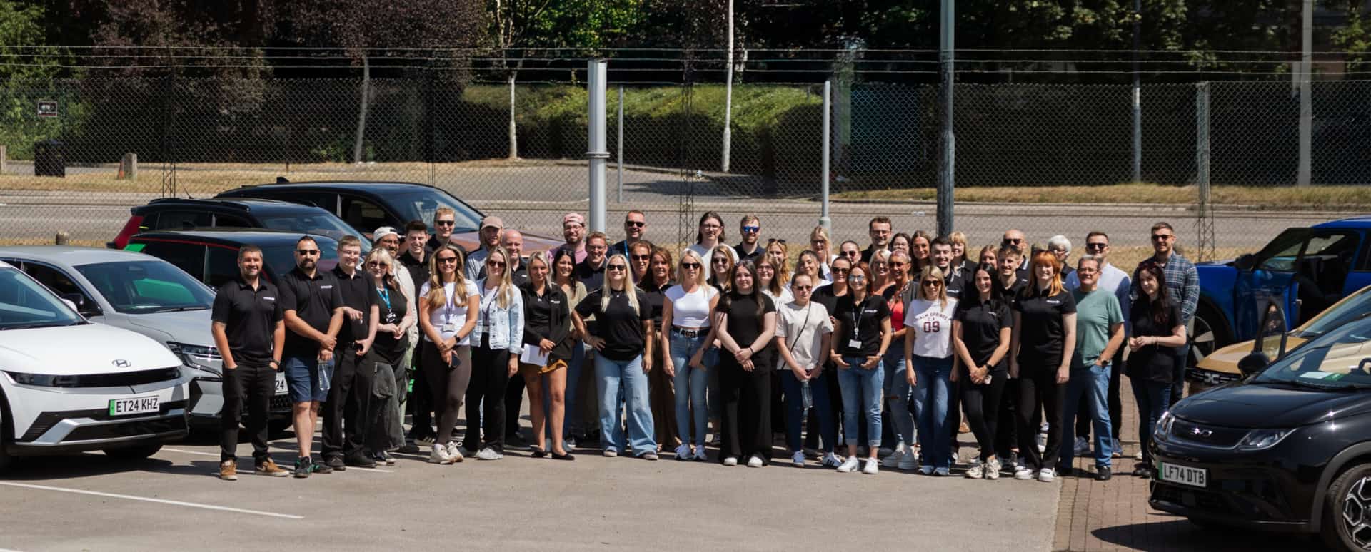 Salary Sacrifice team stood in car park