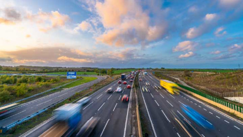 Speeding Vehicles On Motorway Blurred Lights