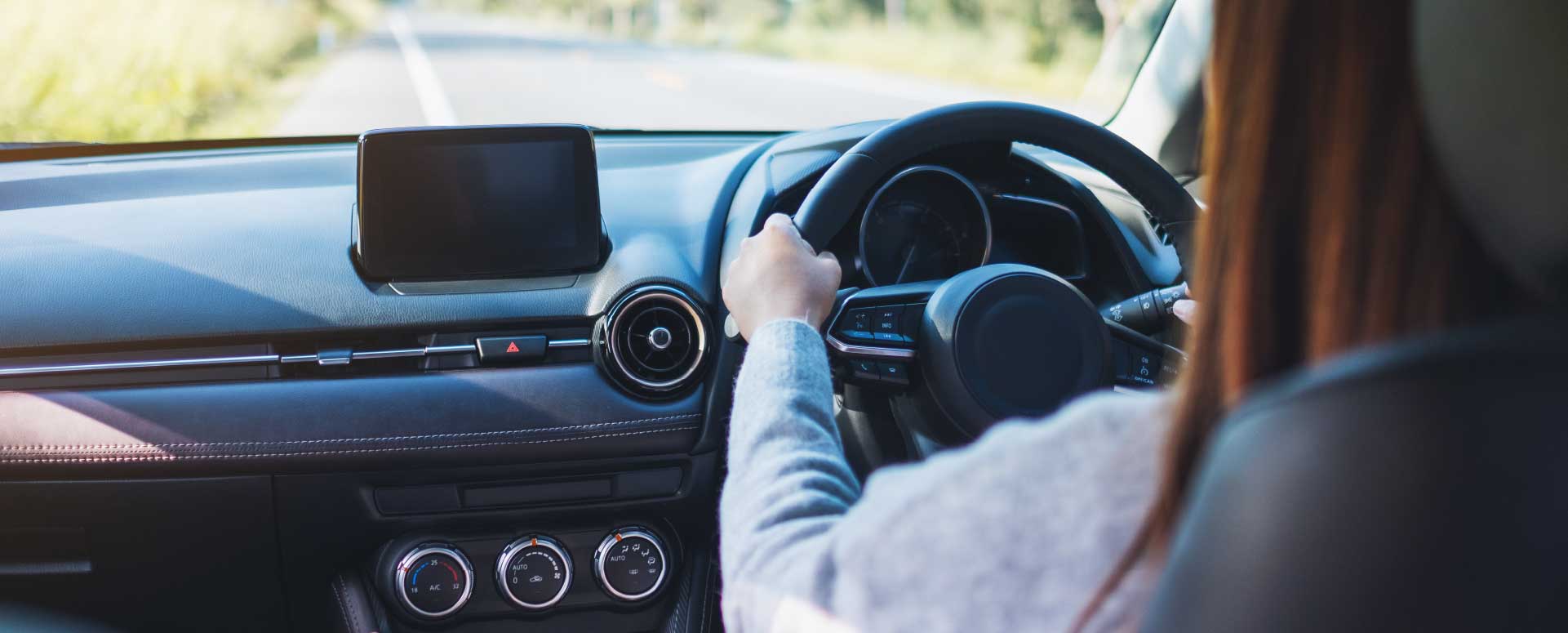 Woman Driving In Car