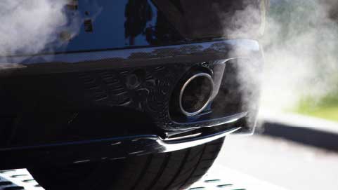 Car exhaust producing emissions