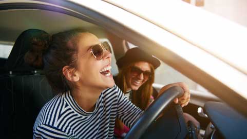 Two People Laughing in Car