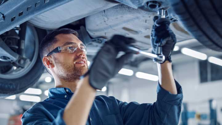 Service Technician Working on Car