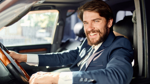 Man Smiling In Car